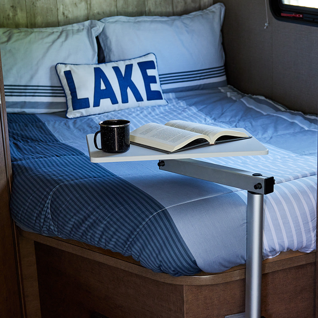 ITC RV Side Table on the wall mount MOD Leg over a bed with book and coffee mug